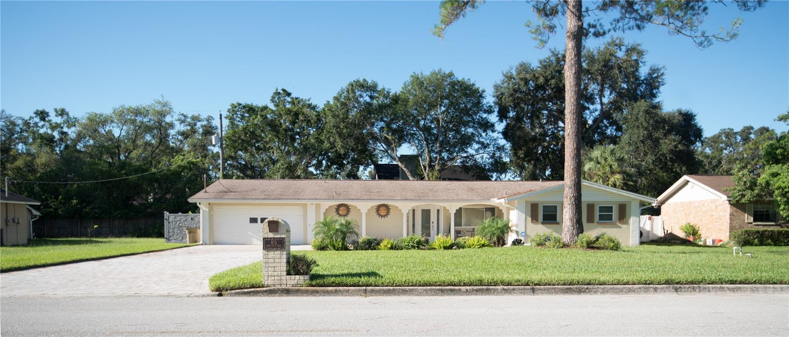 Nestled in the prestigious and tree-lined community of Temple Terrace, this stunning residence offers upscale living just minutes from the heart of the Tampa area. Tour this spacious home with lots of character! This home has an outstanding floor plan with tons of elegant and timeless upgrades. This desirable one story home has 4 bedrooms, 2.5 bathrooms, a 2 Car garage and is move-in ready. It features a gourmet kitchen with Granite countertops & backsplash, 42 inch staggered cabinetry with a lot of storage space, a built-in microwave, stainless steel appliances, and updated tile flooring. The bathrooms have granite countertops, maple cabinets, and decorator finish fixtures, with high quality tile patented from floor to ceiling.
With warm, inviting color tones & designer touches, this home exudes comfort and elegance while offering a perfect blend of style and functionality for modern living. The foyer greets you to an open plan with formal living and dining rooms. The family room opens French doors into the courtyard patio in the rear of the home. The lengthy driveway can park up to 8 cars! Locals schools in the area include charter school TCMS, magnet William Middle School and IB King High School. The neighborhood is highly desirable due to its proximity to USF, Moffitt Cancer Center, VA, University Community Hospital, interstates I-4, I-275, and I-75. The community nearby Temple Terrace boasts a recreation center with tennis courts, pools, after-school care, gymnastics, basketball, volleyball, a gym, and racquetball courts. Don’t miss the rare opportunity to own a beautifully appointed home in one of Temple Terrace’s most sought-after neighborhoods, where elegance, convenience, and community come together.