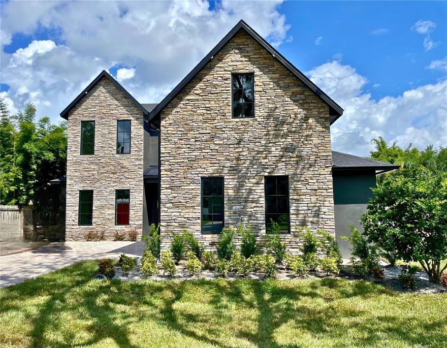 Under Construction. Beautiful New Construction home in the heart of Winter Park. This upscale Magnolia Home features upscale design features throughout. As you enter through the double front doors you are greeted by a tastefully designed foyer and a large office. The large kitchen features an upgraded appliance package, custom cabinetry with upper cabinets and under cabinet lighting, a large island fit for hosting. The primary suite is located on the first floor with a beautifully designed bathroom. Upstairs you will find a large loft, a bonus laundry room and 3 bedrooms each with en-suite bathrooms and beautiful finishes. The outdoor entertaining area is enhanced by a large, covered lanai which features a built-in summer kitchen and a lavish saltwater pool with heated spa. Completion Date September 2023. Call to schedule a showing