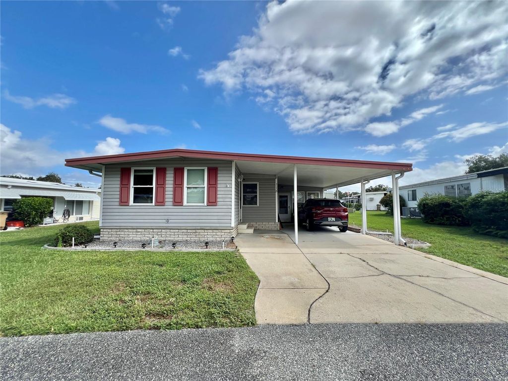 Photo of 115 Gardenia Way, Leesburg, FL 34748 (MLS # G5103101)