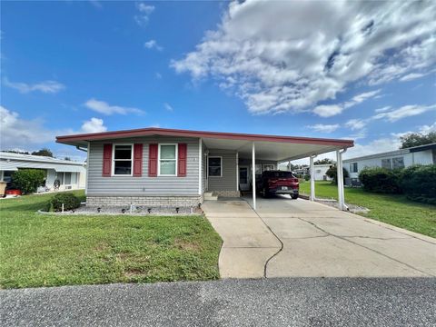 Photo of 115 Gardenia Way, Leesburg, FL 34748 (MLS # G5103101)