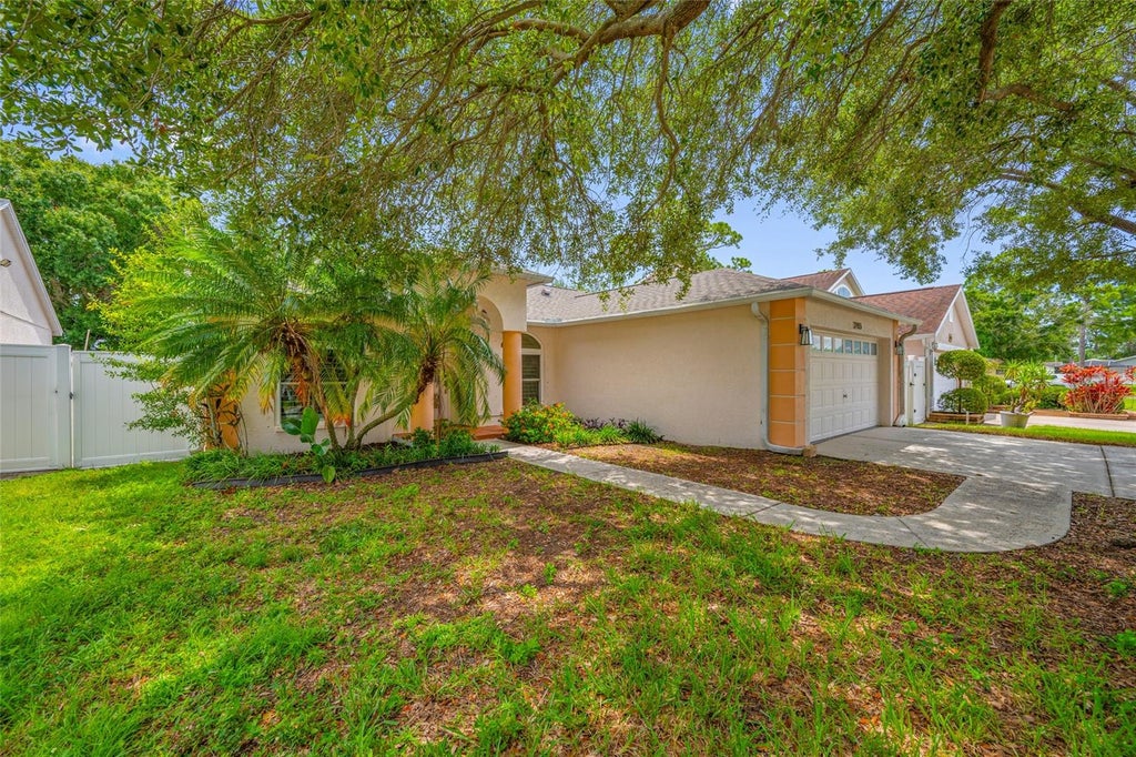 Photo of 12965 Pineforest Way W, Largo, FL 33773 (MLS # TB8534829)