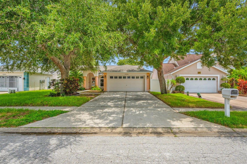 Photo of 12965 Pineforest Way W, Largo, FL 33773 (MLS # TB8534829)