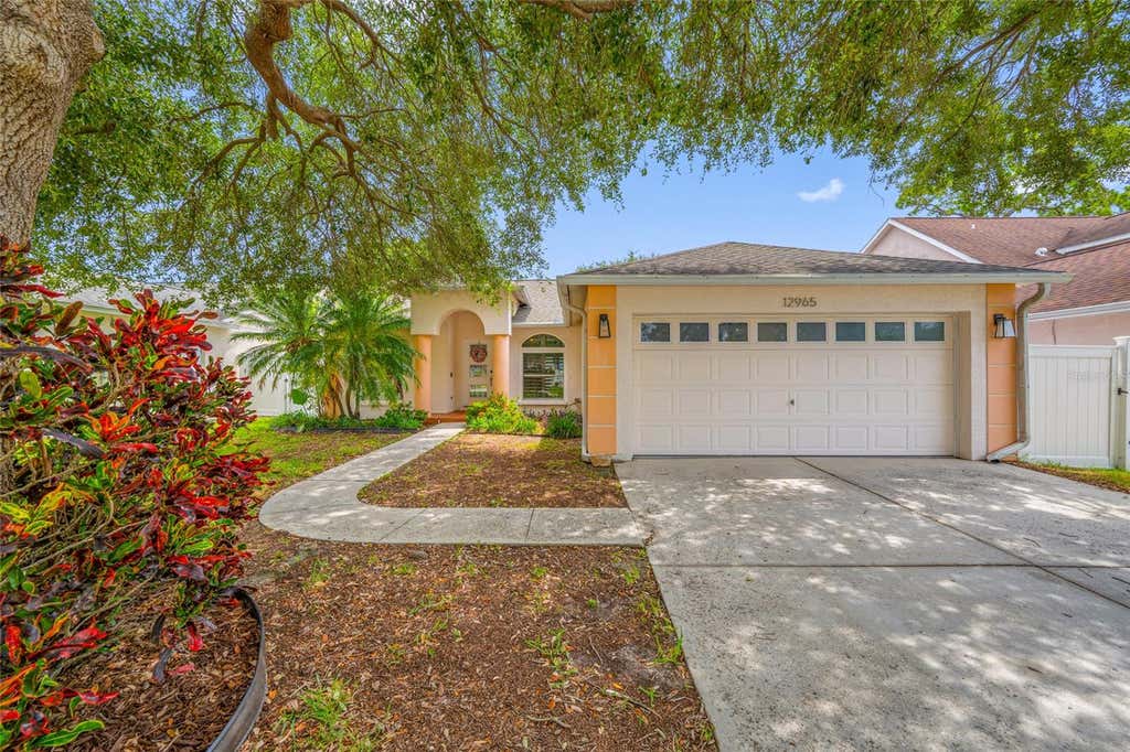 Photo of 12965 Pineforest Way W, Largo, FL 33773 (MLS # TB8534829)