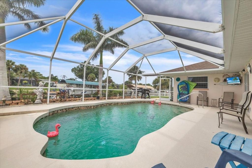 Photo of 3429 Rock Creek Drive, Port Charlotte, FL 33948 (MLS # C7514328)