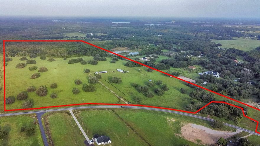 86+ Acres of land zoned agricultural and 22 acres of wetlands in fast growing Clermont.  In the past this land was a citrus grove and hay production. There are two wells on the property and capped off water lines to the pasture areas.  There is a transferable conditional use permit for this property that allows for an equestrian center, training facility and horse shows.  The 3 bedroom, 2 full bath manufactured home was built in 1997 and has been meticulously maintained and is  ready for it's new owner.  The barn has been converted into an air conditioned workshop.  This land offers tremendous potential for horse lovers, farming, greenhouses,  investment or even future development.  Note:  This property is also listed as vacant land G5087324.