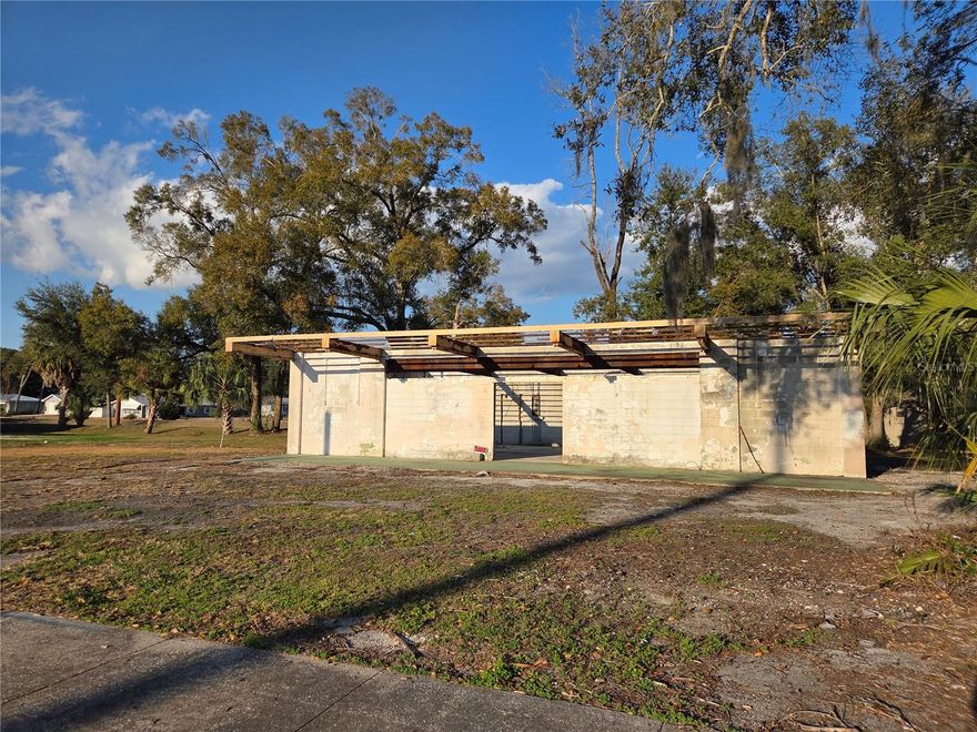 OVERSIZED COMMERCIAL .35 ACRE LOT IN CHIEFLAND. Existing concrete block structure with trusses that needs to be finished. There is public water, and sewer. Located on N Young Boulevard in Chiefland, Florida. Close to schools, shopping, car dealerships, restaurants, etc. Nearby springs. 30 minutes to Cedar Key for fishing and boating.  About 15 minutes from our County Seat in Bronson. Parcel dimensions are about 100' road frontage and 200' deep.