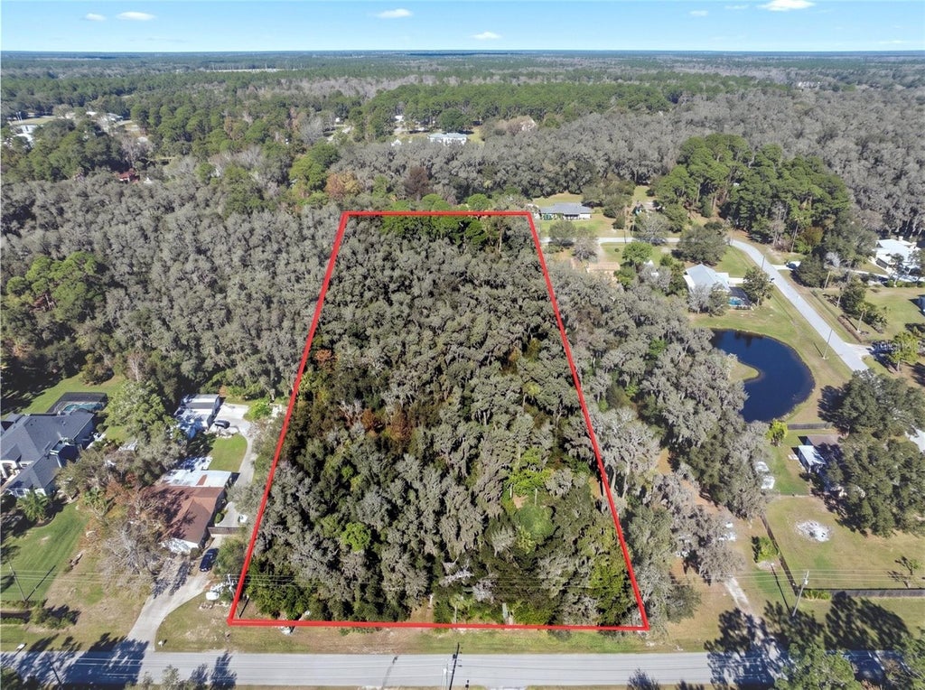 Photo of 32 Country Lane, Lutz, FL 33558 (MLS # A4703566)