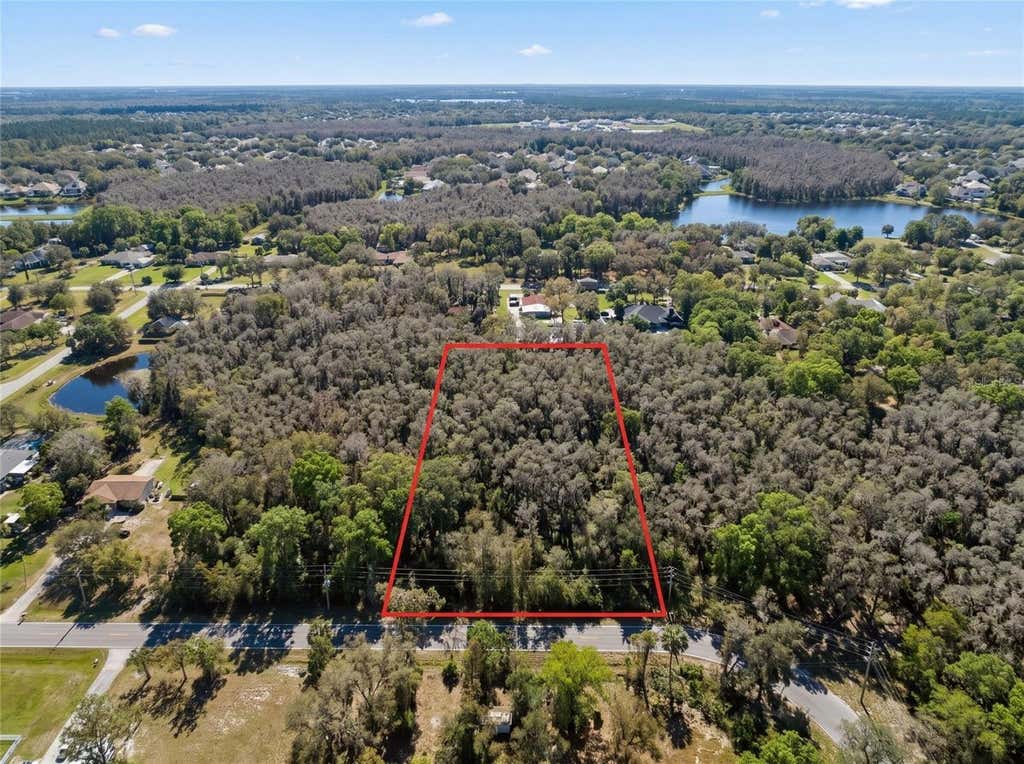Photo of 32 Country Lane, Lutz, FL 33558 (MLS # A4703566)