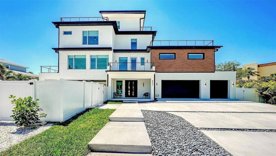 With gulf views, and walkable private beach access, this New Construction Modern Beach House on Siesta Key by M&J Pham Development mixes a sought-after location with modern luxury. Experience the best of coastal living in this brand-new 4 bed, 4.5 bath home with walking access to Turtle Beach. With 3,676 SF of thoughtfully designed space, this home offers breathtaking 360-degree ocean views, multiple outdoor patios and terraces, and seamless indoor-outdoor flow.

Feel the sea breeze in the spacious backyard, including a pool, hot tub, and outdoor kitchen. Enjoy light-toned engineered hardwood floors, a chef’s kitchen with top-tier appliances, and spacious en-suite bedrooms, including a stunning primary suite with a private terrace and spa-like bath. Additional features include a 3-car garage, and 6 covered carport spaces for recreational utility vehicles such as, jet skis, golf carts, or a boat, with easy gate access. Enjoy an elevator included layout, and high-end finishes throughout—all just minutes from Siesta Village’s shops and dining.

This newly built residence offers peace of mind with the latest in building codes, energy efficiency, and storm protection. Modern insulation, impact-rated windows and doors, and up-to-date mechanical systems translate into lower utility bills, reduced maintenance, and enhanced safety. You’ll also benefit from turnkey readiness—no need for costly renovations or updates.

Whether for full-time living or a coastal getaway, this is Siesta Key luxury at its finest.