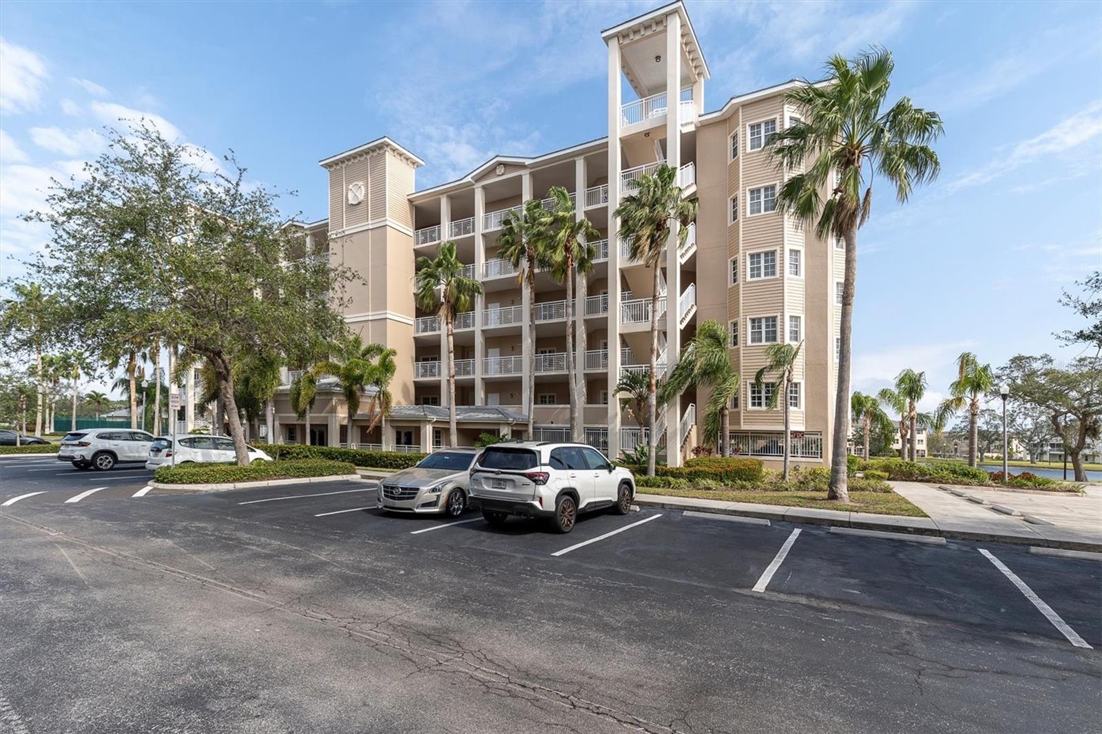 Welcome to your dream condo in this desirable gated waterfront community! This STUNNING 5th floor, 2-bedroom, 2-bathroom condo offers the perfect blend of comfort and style! Step inside to discover a bright and airy living space, complete with a versatile BONUS ROOM that can be used as an office, guest room or den - tailor it to fit your lifestyle! Upon entering the condo you will notice the gorgeous crown molding throughout that lends an air of elegance to the home. The OPEN FLOOR PLAN flows from the kitchen to the living room and out onto the balcony where you can enjoy your morning coffee or unwind in the evenings with a serene water view. The KITCHEN is a chef's dream with an abundance of wood cabinetry, granite counters, breakfast bar and pantry. The separate dining area has a beautiful tray ceiling! The primary bedroom features picturesque water views, sliding glass doors that open onto the balcony, and TWO walk-in closets! The SPACIOUS primary bathroom features dual vanities, walk-in shower, garden tub, and separate water closet for privacy. The large laundry room features gorgeous cabinets perfect for storing supplies and a NEW WASHER AND DRYER! All this and a brand new Water Heater! The condo comes FURNISHED with gorgeous new furniture specifically chosen to fit the ambiance and vibe of the condo, making it easy for you to move in and start enjoying resort style living right away! Step outside to beautiful, maintained grounds. This VIBRANT, PET FRIENDLY, WATERFRONT COMMUNITY makes you feel like you are on vacation year round! Experience exceptional amenities including a sparkling heated pool, state of the art fitness center, and vibrant clubhouse. Whether you are playing pickleball or tennis, or enjoying peaceful days at the fishing pier, or tennis/pickleball courts, there is something for everyone! Kayak enthusiasts will appreciate the canoe launch and the screened picnic pavilions with grills which are perfect for social gatherings. Take a stroll along the scenic walking trail to soak in the breathtaking water views of Long Bayou or gather around the fire pit for cozy evenings with friends. This active community offers a wealth of social activities for residents, making it an ideal place to call home. Located directly across the street from Seminole Lake Park with additional trails, boat launch, and playground. Conveniently located near Seminole Town Center with restaurants, shopping, and movie theater. Only minutes from gulf beaches and more restaurants!!! Easy access to I-275 making any commute easy. Schedule a showing today and see why This is the perfect place to call home!