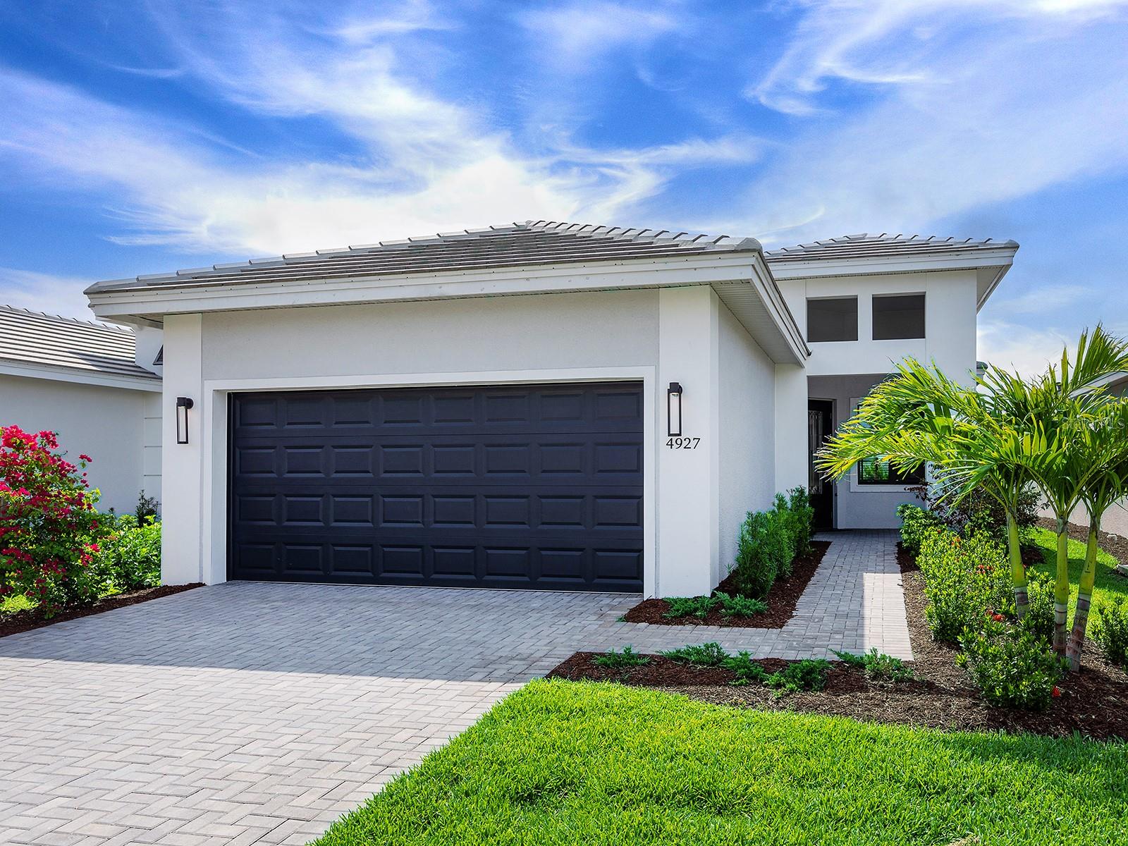 Welcome to Cresswind in one of Florida’s sought-after 55-plus communities in the heart of Lakewood Ranch. BUILDERS WARRANTY TRANSFERS on this priced to sell new build two-bedroom, two-bath home has a spacious den and a two-car garage and offers a blend of comfort, functionality and resort-style amenities. Enter to find an open-concept layout filled with natural light, featuring a generously sized great room, dedicated dining area and a versatile den, ideal for a home office, hobby room or guest space. The kitchen has stainless appliances, ample cabinetry and quartz countertops. The primary suite is a peaceful retreat with two walk-in closets and an en-suite bath featuring dual vanities and a walk-in shower. A split-bedroom design ensures privacy for guests, and the second full bath is conveniently nearby. The two-car garage provides ample storage space and convenience. This active adult community offers a wealth of amenities, including a clubhouse, resort-style pool, fitness center, tennis and pickleball courts, and numerous social activities. The Cresswind SmartFIT Training Center is powered by EGYM and uses state-of-the-art fitness technology to help you reach your fitness goals with 20-minute workouts, twice a week. Plus, you're just minutes from world-class golf, shopping, dining, medical facilities and beautiful Gulf beaches. Live the lifestyle you’ve been waiting for — comfort, convenience and community all in one place.