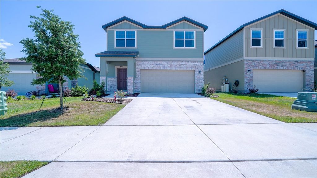 Photo of 8735 Sportsman Loop, Groveland, FL 34736 (MLS # O6401057)