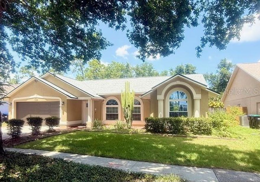 Beautifully maintained 3-bedroom, Plus Den ( could be used a s a 4th bedroom ) 2-bathroom, home in East Orlando! The spacious open floor plan is filled with light and great for entertaining or family time. The large living room has laminate floors, large arched windows, and it flows to the open kitchen-dining room. The kitchen has stone countertops, a dining bar, a gas stove, and space for a breakfast table or dinette. The kitchen flows to a space that could be used as a formal dining room, home office, or a bonus family room. The primary suite has a large en-suite bath that has a separate garden tub and walk-in shower, dual sinks, and an updated vanity and his and hers closets. The second and third bedrooms share the hall bath. The home also offers a large two-car garage, full-size washer/dryer, covered front porch, large fenced backyard with a lovely screened porch, paver patio, and large shed that is great for storage or could make a nice workshop. Minutes to UCF, Lockheed Martin, Enovation Business Complex. Easy access to Highway 417 and 408 to easily get to Orlando International, Downtown Orlando, Orlando Health, Full Sail University, Research Parkway, Siemens, Seminole State College, Waterford Lakes Plaza and all of the amazing restaurants, shopping, entertainment and events! This is an HOA-restricted community, so they do not allow more than two unrelated roommates. This home is currently leased through August 2026. This home could be a fantastic 1031 or investment with instant income.