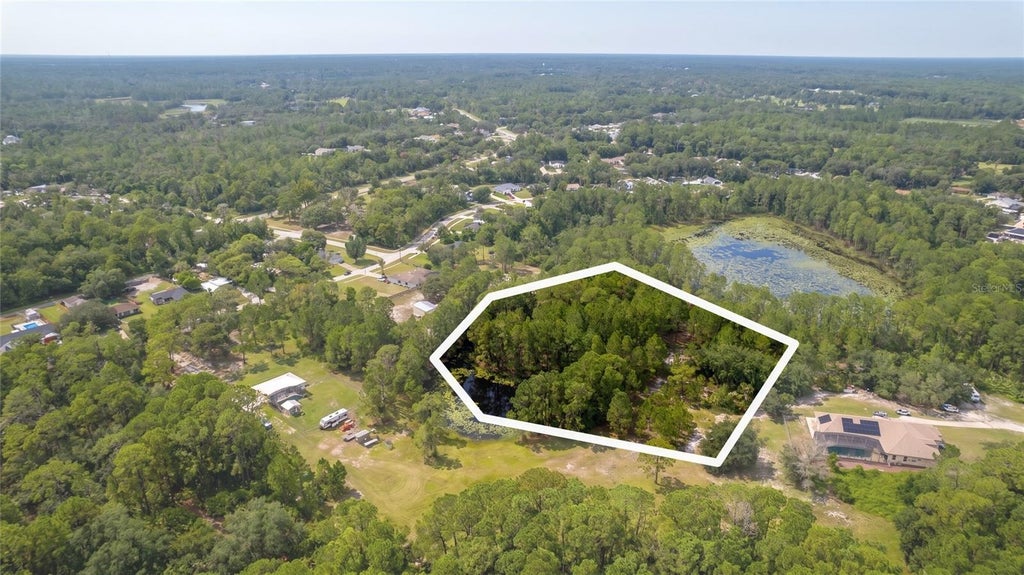 Photo of 3106 Saint James Avenue, Deltona, FL 32738 (MLS # O6429128)