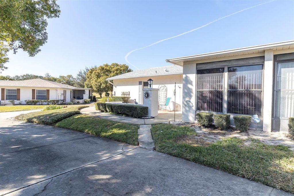 Photo of 8141 Braddock Circle #3, Port Richey, FL 34668 (MLS # W7882570)