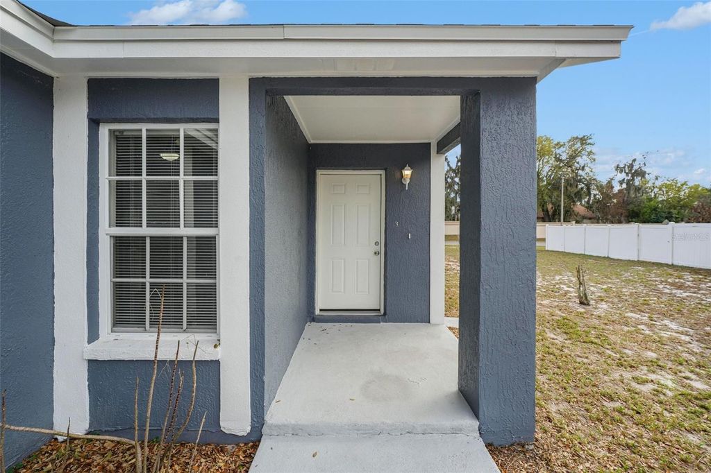 Photo of 3339 Queens Cove Loop, Winter Haven, FL 33880 (MLS # O6386232)