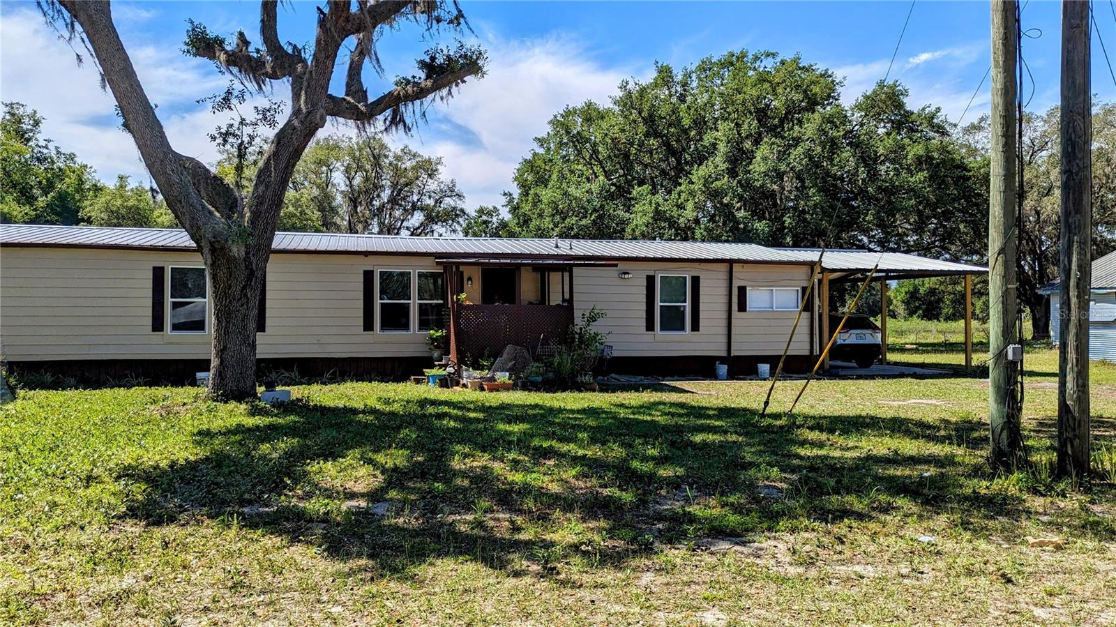 This is a 4 bedroom 2 bath home located in a peaceful setting on a private 12 acre lot with only 3 homes on the property! Tucked away from noise and chaos but within minutes from all of the necessities. Set up your showing today!