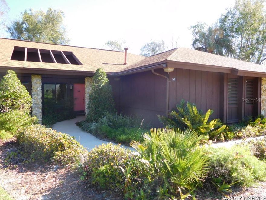 Light & bright with open floorplan! Tropically landscaped courtyard welcomes you to this beautiful home which offers lots of privacy! Do you have a hobby that needs a workspace? Oversized 2 car garage with tons of built-in cabinets, workshop, storage closet & screened entrance. Spacious tiled foyer opens to the living room with cozy gas fireplace, vaulted ceilings & lots of natural light from the sun tunnels. This immaculate 2BR/2BA/2 GAR home is situated on a large tree shaded lot. Spacious family room has attractive murphy bed with built in shelves & a closet so it could be used as a 3rd BR or office. It has walls of floor to ceiling windows with lots of natural light & overlooks the private backyard. Master BR has a newer tiled step-shower, walk-in closet and opens through french doors to a wood deck area great for morning coffee or afternoon delights! Amenities in this home include crown molding, indirect & recessed lighting, lots of closets & built-in storage. Gourmet Kitchen has a gas stove, corion counters, tons of cabinets & drawers, huge pantry, homemakers desk & a breakfast nook that opens to a key west style screened porch. Several different memberships are available to join the Sugar Mill Country Club & Golf Course, including pool, fitness center, restaurants & a world class 27 hole golf course. See sellers disclosure for upgrades, etc. Enjoy the Florida lifestyle today! ;Water: City