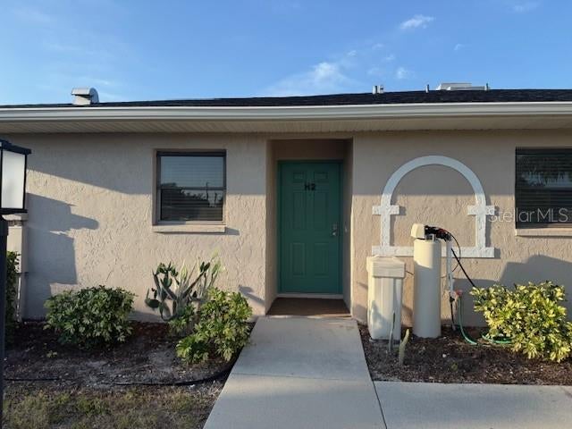 Photo of 24540 Harborview Road #H2, Port Charlotte, FL 33980 (MLS # C7530773)