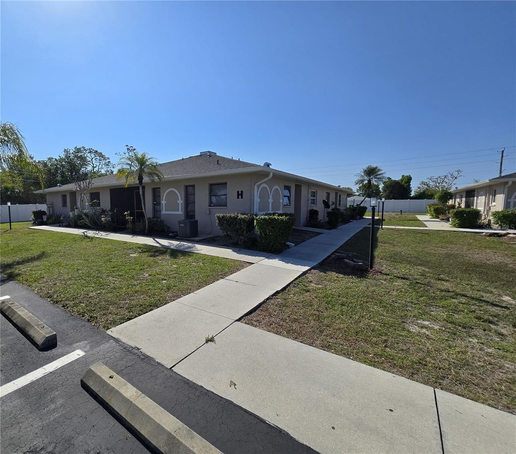 Photo of 24540 Harborview Road #H2, Port Charlotte, FL 33980 (MLS # C7530773)