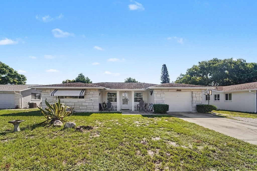 Photo of 10214 Holly Drive, Port Richey, FL 34668 (MLS # TB8548946)