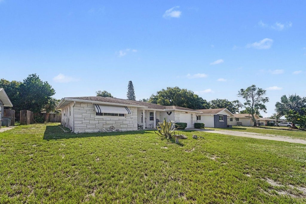 Photo of 10214 Holly Drive, Port Richey, FL 34668 (MLS # TB8548946)