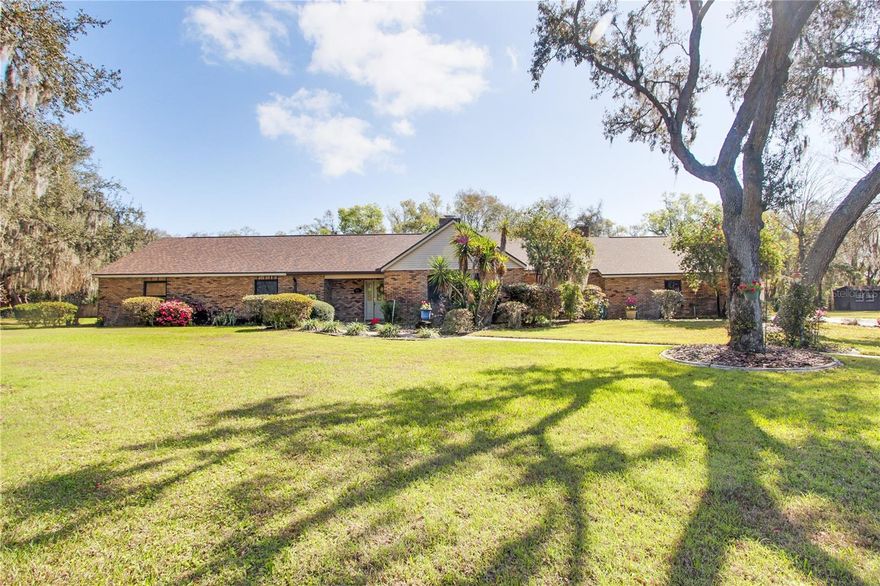 One or more photo(s) has been virtually staged. Move-in ready 4 Bdrm/2 Bath brick pool home located on a 1.06-acre cul-de-sac lot in desirable Lake Unity
Village. Offering 3,051 Sq Ft of living space, this well-maintained home features both an open
living/dining/kitchen great room and a separate family room, each with its own wood-burning fireplace. The
gourmet kitchen has been upgraded with granite countertops, a granite island with cooktop and vent hood,
stainless steel double ovens, a brand-new French door refrigerator, and a custom-built pantry. Sliding glass
doors lead to a spacious, partially covered pool deck with a birdcage enclosure that was recently re-screened
(2025). Pool pump and filter tank replaced in 2023. Three generous guest bedrooms provide comfortable
accommodations and lead to the expansive primary suite, featuring its own screened lanai (2025). The en-
suite bath offers dual walk-in closets, an updated walk-in shower, a new soaking tub, and quartz countertops
completed in 2025. Significant recent improvements include a new roof (2025), two new HVAC systems
(2024), a new well and pressure tank (2024) while retaining the original operational well for irrigation, 
water heater (2015), and double-pane Pella windows installed in 2017. A spacious three-car garage provides
ample storage and parking. Situated in a friendly, private neighborhood while remaining convenient to
shopping, dining, and everyday amenities, this property offers space, functionality, and peace of mind with
major system updates already completed. Don’t miss your opportunity—schedule your private showing
today before it’s gone!