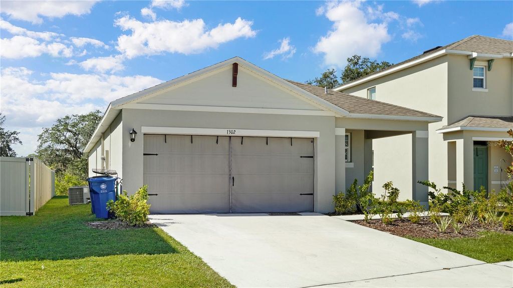 Photo of 1302 Holodak Drive, Davenport, FL 33837 (MLS # S5136884)