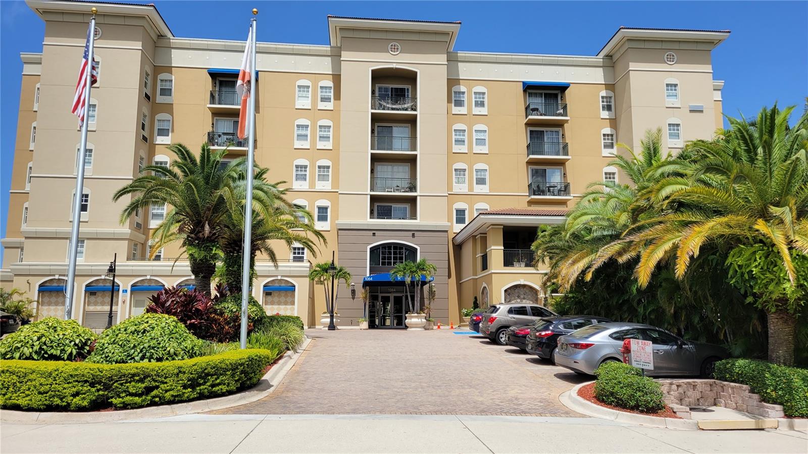 Annual UNfurnished 2/2 penthouse floor condo. The Broadway Promenade is a luxury condominium development of 187 units across the street from Sarasota Bay in the city's cultural arts district. This top floor unit is bright and cheery and filled with natural light from 2 sliding glass doors leading to lanai. Partial water view of the Sarasota Bay and view of the waterfront in the city. The kitchen boasts slab granite counter tops, solid wooden cabinetry with soft close drawers, stainless steel appliances, a breakfast bar, pass thru to dining area, and a pantry. The master bedroom has a large walk-in closet, and en-suite bathroom with huge soaking tub and separate walk-in shower. The 2nd bedroom could be another master suite wit pocket door for privacy, and a large walk in closet. Full size laundry off the kitchen. The flooring is all wood or tile so NO CARPETING!! This condo also comes with garage parking for 2 vehicles. The building has 24-hr concierge with long-term, caring staff, resort-style heated pool and spa, BBQ grills, and outdoor or covered dining, well-equipped fitness center with locker room and sauna, club room with full kitchen and bar, library, activity room with business center, pool table, and seating area with large screen TV, guest suites and more! Publix is right outside your front door, and The Van Wezel and Municipal Auditorium are across the street, and a lot of shopping and dining located nearby. Sorry, no pets per the association. Call TODAY, so you don't miss out on this one. NOTE: This community is governed by a homeowners association. Approval may include an application, background screening, fees, and an approval process. Contact the agent for details.