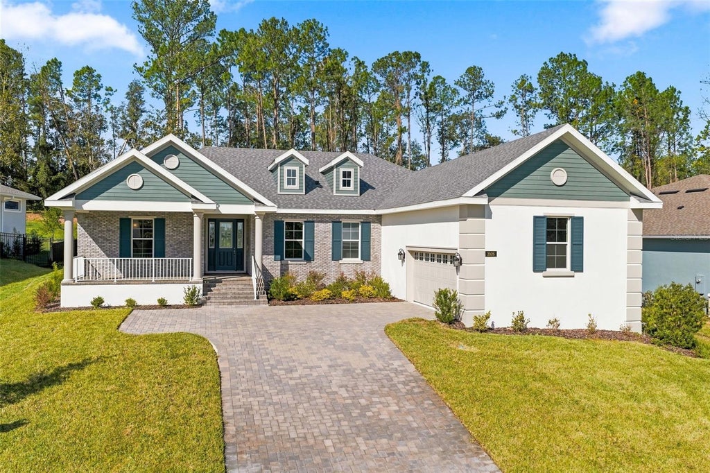 Photo of 3926 Southern Valley Loop, Brooksville, FL 34601 (MLS # W7890737)