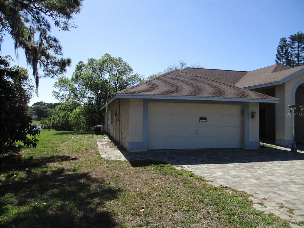 Photo of 8904 Planters Lane, New Port Richey, FL 34654 (MLS # W7885244)