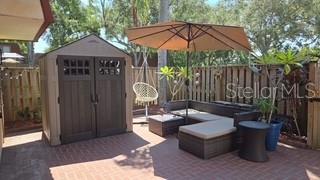 Welcome to this beautifully updated townhome in the desirable Wedgewood community of Palm Harbor! This 2 bedroom 2.5 bath residence offers a spacious layout with brand new flooring throughout and no carpet anywhere. The light and bright living areas flow seamlessly to the private courtyard, perfect for relaxing or entertaining. Upstairs you will find two generous bedrooms, each with its own balcony overlooking the patio, providing plenty of natural light and privacy.
Enjoy the convenience of two assigned parking spaces right outside your door, plus an outdoor storage shed for extra space. Wedgewood offers fantastic amenities including a pool, tennis courts, playground, and fishing pond, all surrounded by mature trees and green space. With its central location near top rated schools, shopping, dining, and just minutes to the beaches, this home combines comfort, convenience, and value. Do not miss your chance to own a move in ready property in the heart of Palm Harbor!