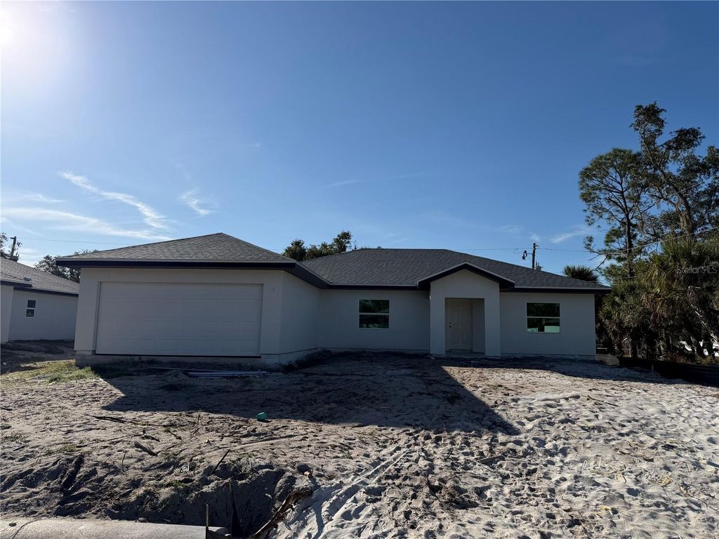 Photo of 15053 Mcgraw Avenue, Port Charlotte, FL 33953 (MLS # D6145660)