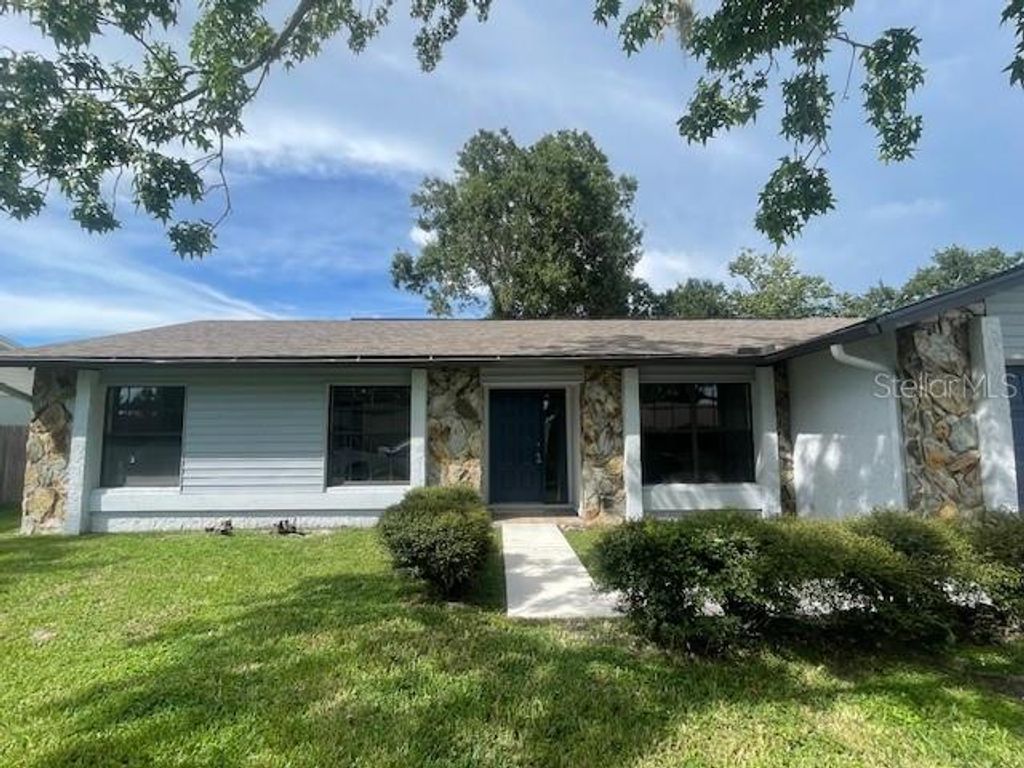 Photo of 4421 Ranchwood Lane, Tampa, FL 33624 (MLS # TB8413370)