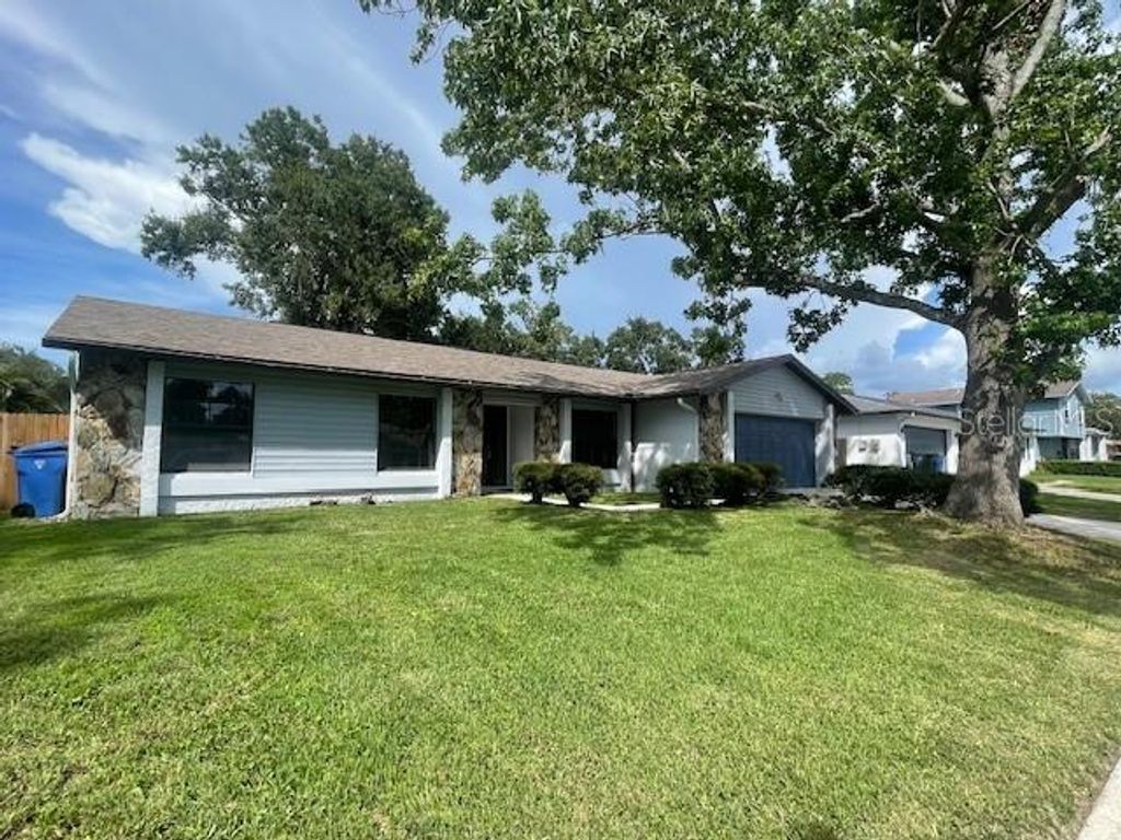 Photo of 4421 Ranchwood Lane, Tampa, FL 33624 (MLS # TB8413370)