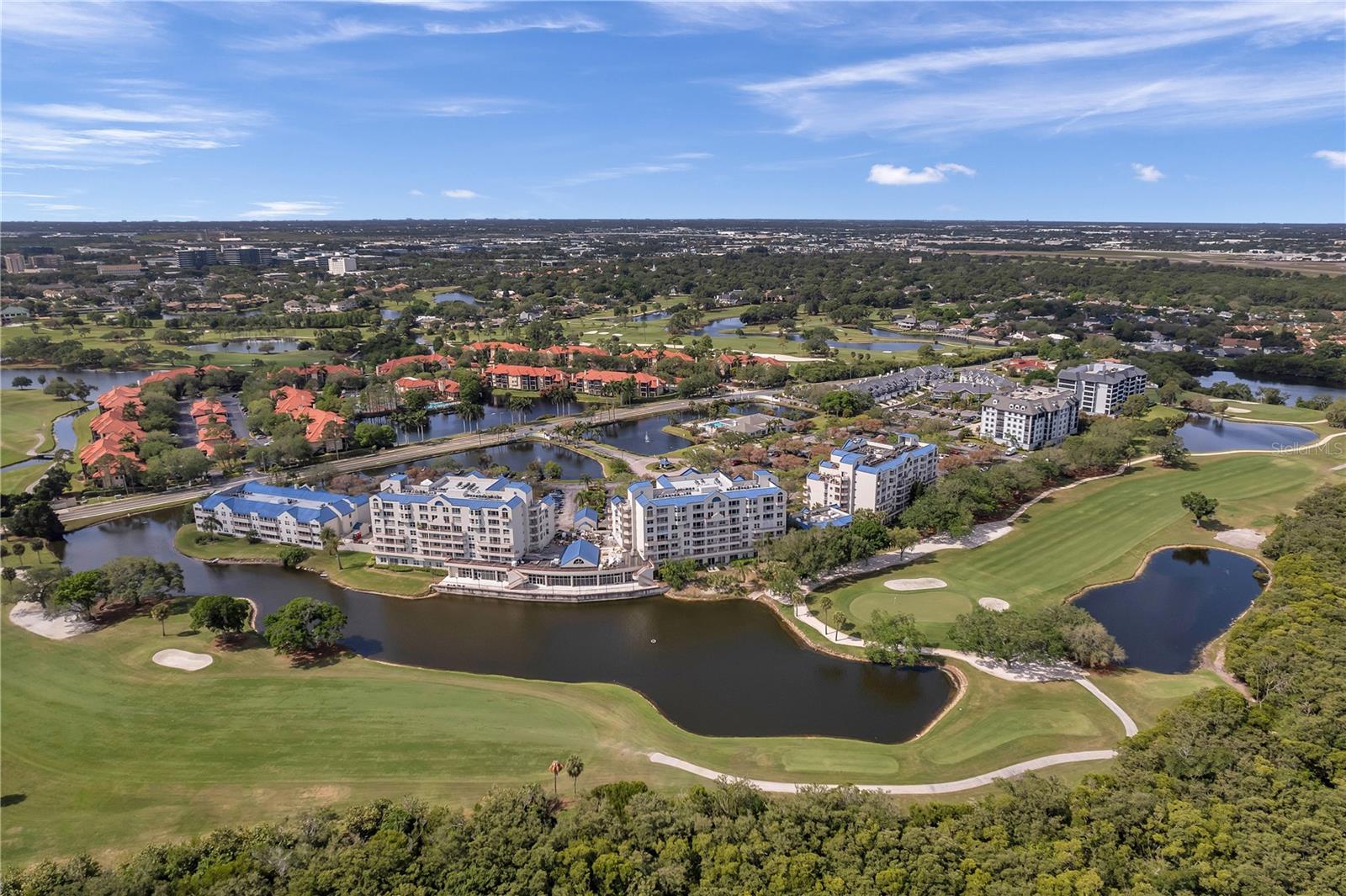 Welcome to Crystal Bay, an elegant oasis nestled within the Feather Sound Country Club Community, one of the Tampa Bay area's most desirable and well-connected neighborhoods. This beautifully updated 2-bedroom, 2-bathroom condo offers the perfect balance of style, comfort, and convenience, enhanced by breathtaking views of both the Feather Sound golf course and tranquil water features from every room.
Located on the third floor of a secured-access building, this unit provides elevated privacy and panoramic views. Step inside to a well-designed split floor plan offering two spacious primary suites, each with walk-in closets and private, tastefully updated bathrooms. One suite features a tub/shower combination, while the other boasts a walk-in shower accented by glass block detailing, a modern touch that adds both light and sophistication.
The heart of the home is the open-concept living and dining area, perfectly suited for both quiet evenings and entertaining guests. Sliding glass doors lead to a screened-in patio and wraparound balcony, where you can sip your morning coffee or unwind at sunset, surrounded by serene views of the fountain, fairways, and lush landscaping.
The updated kitchen is a standout, designed with both functionality and aesthetics in mind. It features solid wood cabinetry, slate tile countertops, modern lighting, and not one, but two pantry closets — ideal for organized living. Adjacent to the kitchen, the dining and living spaces flow effortlessly, all unified by oversized ceramic tile flooring and elegant crown molding throughout.
Additional features include a dedicated laundry room with in-unit washer and dryer.
Residents of Crystal Bay enjoy resort-style amenities including a swimming pool and spa, poolside grilling area, and a stylish clubhouse featuring a full kitchen, billiards room, fitness center, sauna, and a library — all within a secure, beautifully maintained complex.
This condo includes one assigned parking space, along with plenty of guest parking available. Pet-friendly (up to 25 lbs) and investor-friendly, with rental potential and low maintenance living.
Situated just minutes from Tampa International Airport, downtown St. Petersburg, and Clearwater’s award-winning beaches, the location offers unparalleled access to Carillon Business Park, fine dining, shopping, golf, tennis, parks, and entertainment. Whether you're searching for a refined primary residence, a turnkey vacation home, or an attractive investment property, this is a rare opportunity to own a slice of paradise in a community known for its elegance and convenience.