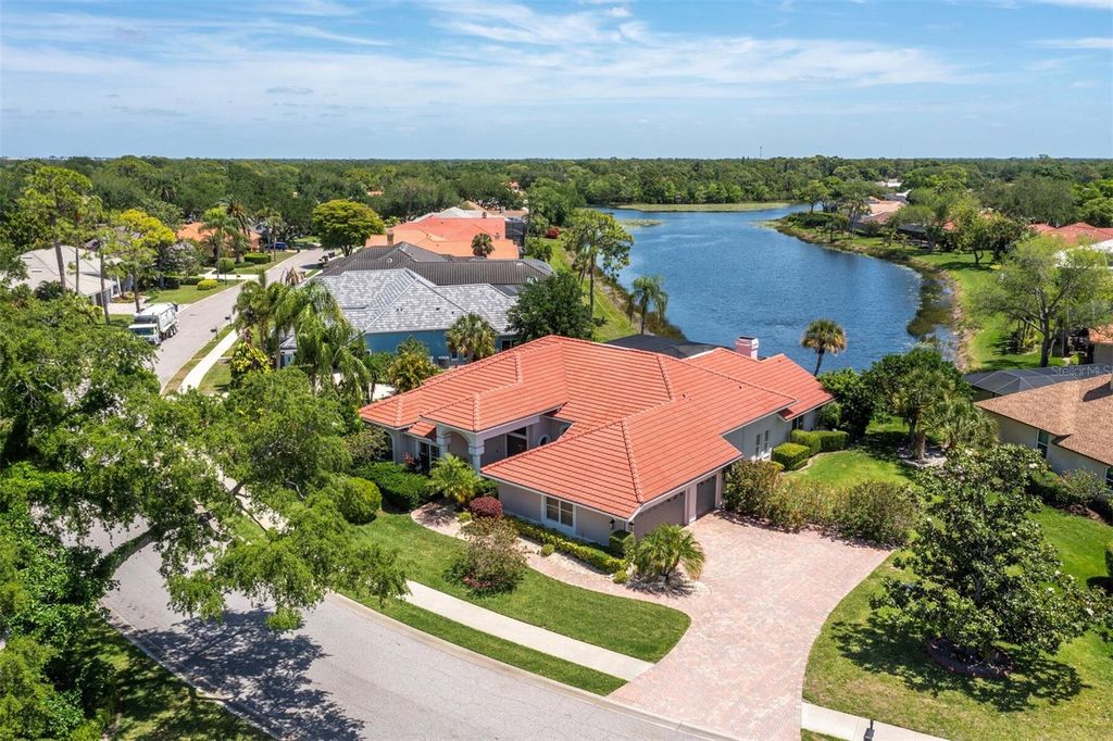 Photo of 8615 Woodbriar Drive, Sarasota, FL 34238 (MLS # A4690117)