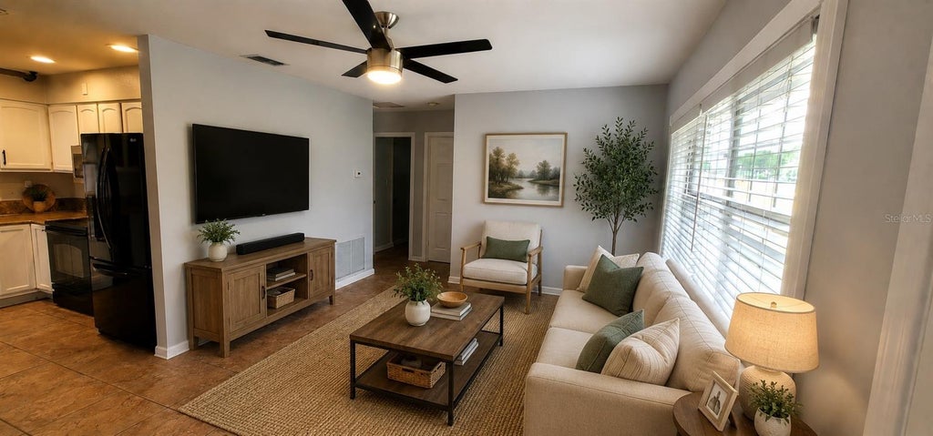 Photo of 1215 E Lakeshore Boulevard, Saint Cloud, FL 34769 (MLS # S5149864)