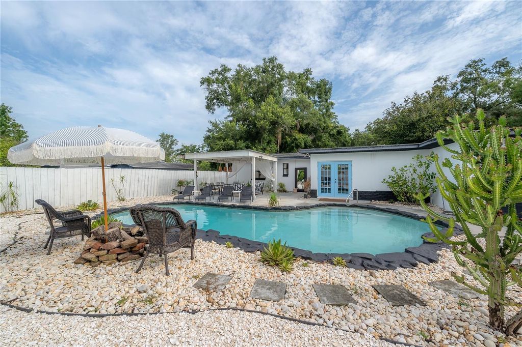 Photo of 1304 W Bogie Drive, Tampa, FL 33612 (MLS # TB8491148)