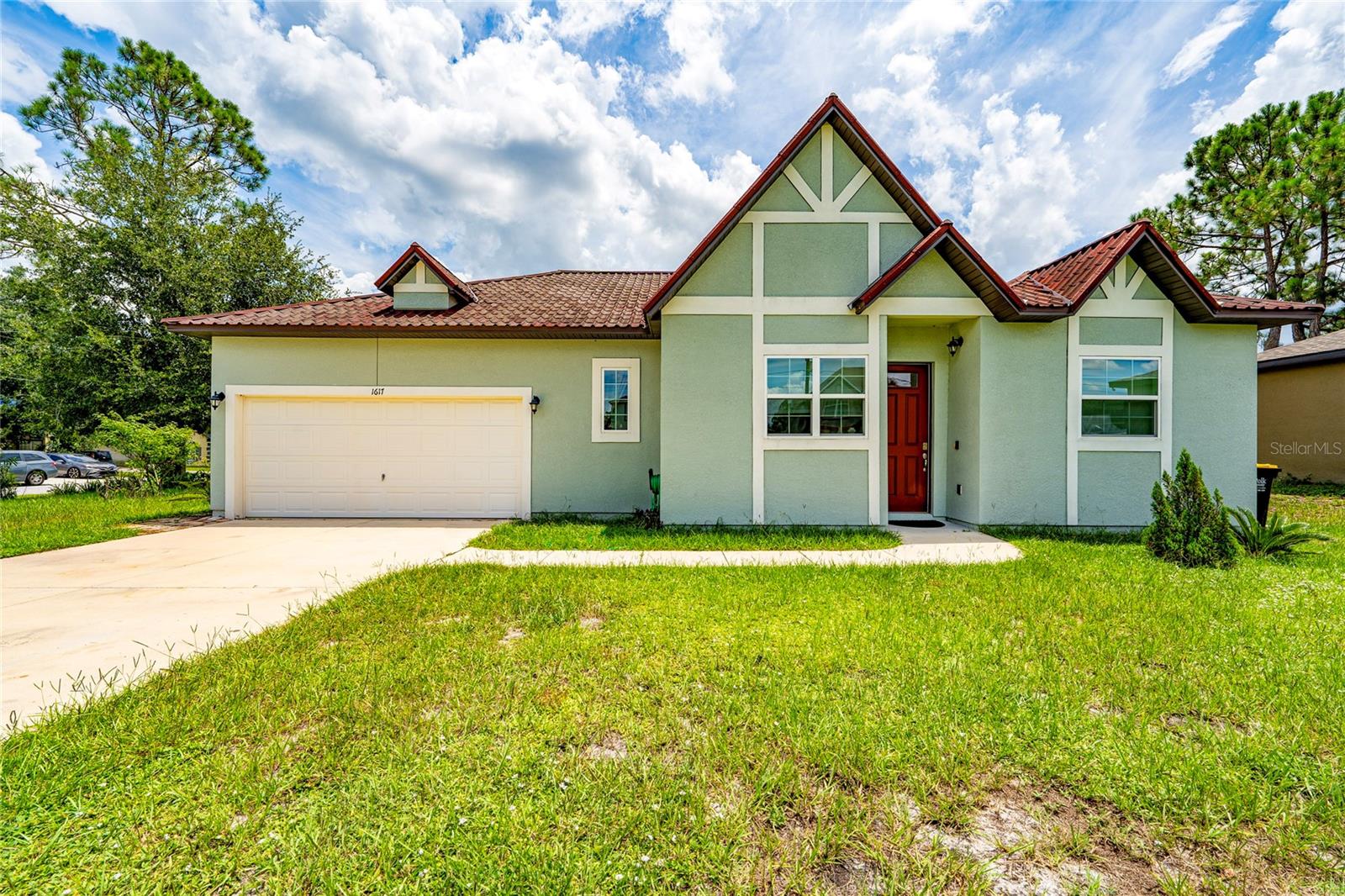 Discover your dream home in the Poinciana community home features an open living room that flows into a beautiful design dining area and kitchen perfect for entertaining family and friends you know that the kitchen is the heart of every home including stainless steel refrigerator range with microwave and dishwasher. The primary suite includes a private bath and a spectacular walk-in closet three more inviting bedrooms and a full secondary bath providing ample space a two-car garage offering plenty of storage and enjoy energy efficient dual-panel windows enhancing comfort. And let's not forget the beautiful tile roof and laminate floors throughout the entire property. That way you can embrace the beautiful Florida lifestyle living with just minutes away you'll find a brand new mall with plenty of shopping and restaurants to discover. This beautiful property will fit well with first time buyers and also investors income rental potential. So don't let this one slide through your hands. Make this home you're oasis but won't last long on the market buy with confidence property is only 5 years old and very well maintained.