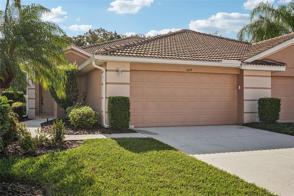 Photo of 409 Fairway Isles Lane, Bradenton, FL 34212 (MLS # N6141762)
