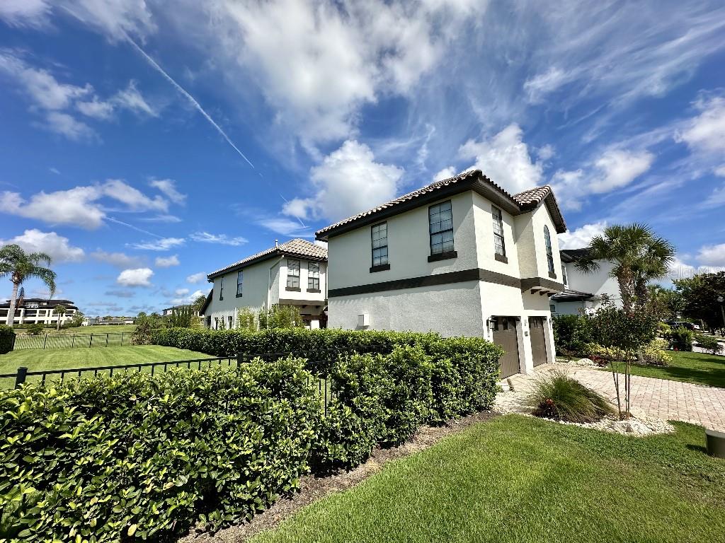 This remarkable listing presents a unique opportunity for those seeking a luxurious residence in a coveted location! Nestled atop the hill overlooking Jack Nicklaus's iconic hole #6, this home offers stunning million-dollar golf course views. One of the standout features is the inclusion of a golf club membership, which enhances the allure for golf enthusiasts. Additionally, it is one of the rare homes in Reunion that boasts vacant lots on both sides, ensuring a serene environment for ultimate privacy.
Imagine unwinding in your west-facing pool while basking in the beauty of breathtaking sunsets and the sight of hot air balloons drifting above. This secluded haven is located within the gated community of Reunion’s Golf Club, merely minutes away from the magical Walt Disney World and other renowned theme parks. The property is thoughtfully designed for pet owners, featuring a fully fenced rear and side yard, perfect for your furry friends to roam freely.
The meticulously redone landscaping showcases a vibrant array of new grass, majestic palm trees, including large coconut and graceful papaya trees, along with banana trees and various other plants, such as bamboo, which provide both privacy and shade. The pool is equipped with a gas heater, ensuring year-round enjoyment, while the house features an upgraded water filtration and softener system for enhanced comfort and convenience.
Inside, a washer and dryer are conveniently located in the main house, with an additional set available in the garage for the separate guest suite. The outdoor space is perfect for entertaining, complete with a private patio adorned with lush bleeding heart vines that create a picturesque shaded area. The outdoor grill, connected to natural gas, makes for effortless grilling and adds an extra layer of enjoyment to your outdoor gatherings.
This home is truly one-of-a-kind within the Reunion community! With its exceptional features and desirable location, it’s an opportunity you won’t want to miss. The Reunion Resort also boasts extraordinary amenities, including three world-class championship golf courses designed by legends like Arnold Palmer, Tom Watson, and Jack Nicklaus. Additionally, residents can enjoy access to twelve community pools, including a multimillion-dollar water park featuring a lazy river and thrilling water slide. Don't hesitate to schedule your appointment today to experience this extraordinary property firsthand!
Schedule your appointment today!
*Home has golf club membership
*Owner is a licensed agent