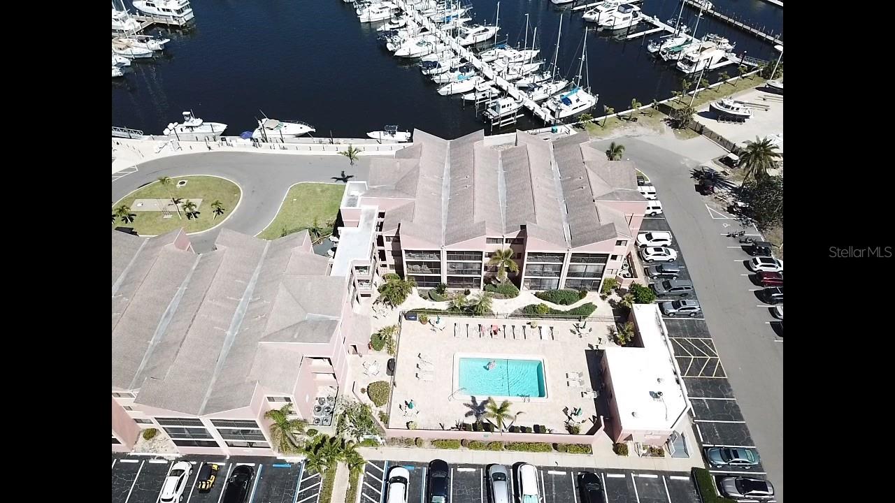 1 bedroom 1 bath 3rd floor pool view condo in the Keel Club of Burnt Store Marina. This updated unit produces consistent cash flow as there are no rental restrictions and short term leases are allowed. Sold turn key, the tastefully decorated interior boasts granite counter tops, tile flooring and an indoor laundry room. There is an elevator for easy access to the 3rd floor and the Keel Club is conveniently located Cass Cay restaurant the Harbormasters office, boat docks and the boat dry stacks. The covered and screen balcony boast a southern view of the pool area which allows partial sunset views.