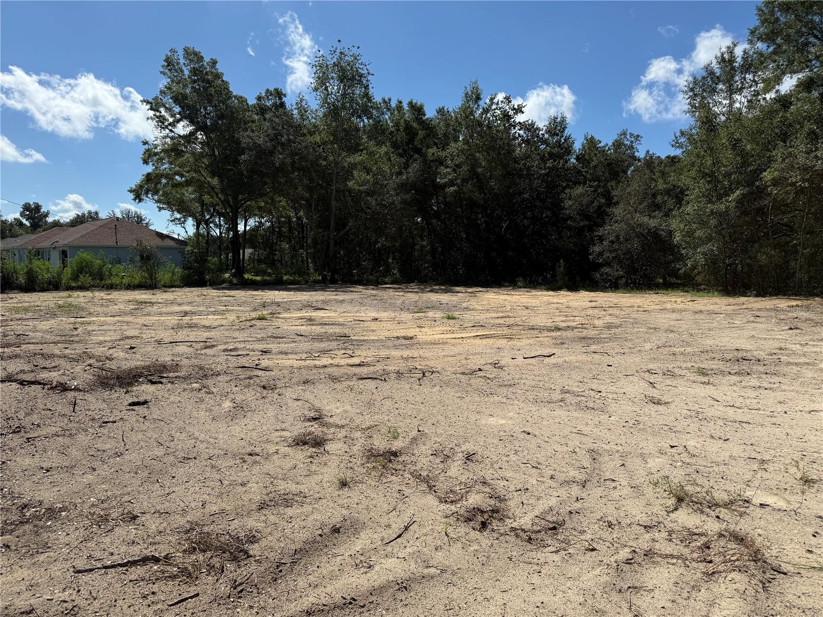 13506 SW 106th St, Dunnellon, FL 34432
Lot Size: 0.22 acres · Zoning: R1 · No HOA
Build-ready lot in Dunnellon with active building permit and approved plans included for the Florida model: 4 bedrooms, 2 bathrooms, 2-car garage, 1,571 sq.ft. under air and 2,147 sq.ft. total.
The property is cleared and level, with access to well and septic according to zoning (no municipal water bill) and a nearby power pole for quick connection. Located in a quiet residential area just minutes from the Dunnellon River and Rainbow Springs, with easy access to schools, shopping, and recreation.
Investor’s Advantage: Because the lot is already cleared and the building permit is approved, you save 3–4 months of work (land clearing, permitting) and can start construction today. This means you could have a finished home ready to generate income in record time.
High-Demand Floor Plan: The Florida model was designed to be spacious enough for large families, making it highly attractive in this area. For investors, this translates into higher rental potential and stronger returns compared to smaller homes.
Additional Opportunity for Investors: Adjacent lot is also available for purchase — it is cleared, has an active building permit, and approved plans.
Perfect for an investment property or your primary residence in a natural setting with no HOA restrictions.