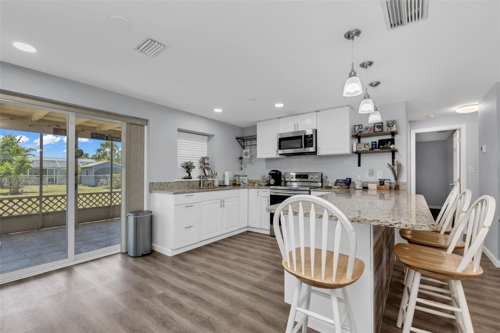 Photo of 433 Glenridge Avenue NW, Port Charlotte, FL 33952 (MLS # C7526225)
