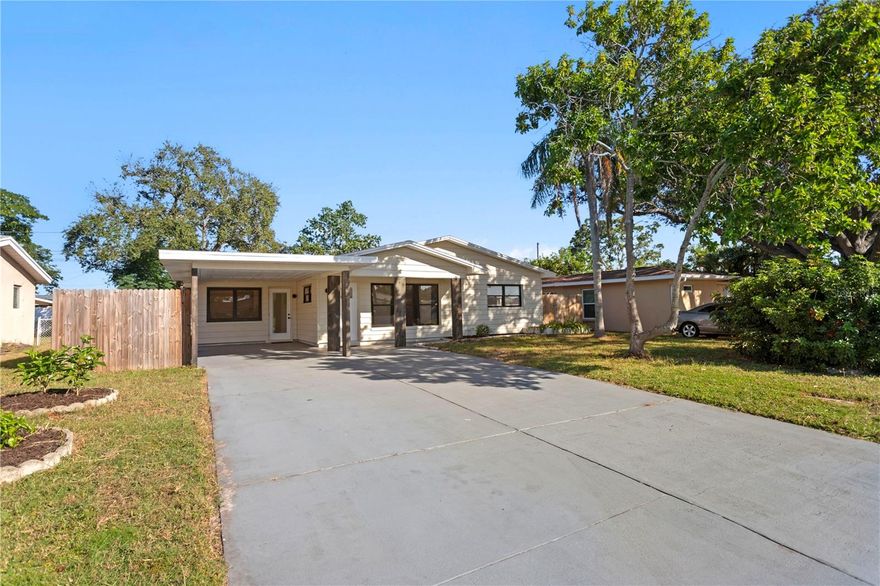 Prime Seminole Location. Updated and Move-In Ready! Perfectly situated near Seminole City Center, Seminole Recreation Center, and Largo Mall, this beautifully updated concrete block home (covered with siding) offers easy living in a high-and-dry, non-flood zone neighborhood. Freshly painted inside and out, the home features new flooring, a brand-new roof, updated electrical, and a modernized kitchen with new appliances and new stylish 1/2 bath. Enjoy a flexible floor plan with three bedrooms, one and a half baths, and a bonus den or office, ideal for working from home or extra guest space. Additional highlights include a 2019 HVAC system, upgraded electrical panel, and plenty of storage throughout. The property offers excellent outdoor space with a large fenced backyard, a spacious front yard, and a carport with ample parking. No rental restrictions make this a fantastic primary home or investment opportunity. Located just minutes to shopping, dining, entertainment, and the Gulf beaches, this home truly delivers comfort, convenience, and value in one of Seminole’s most desirable areas.