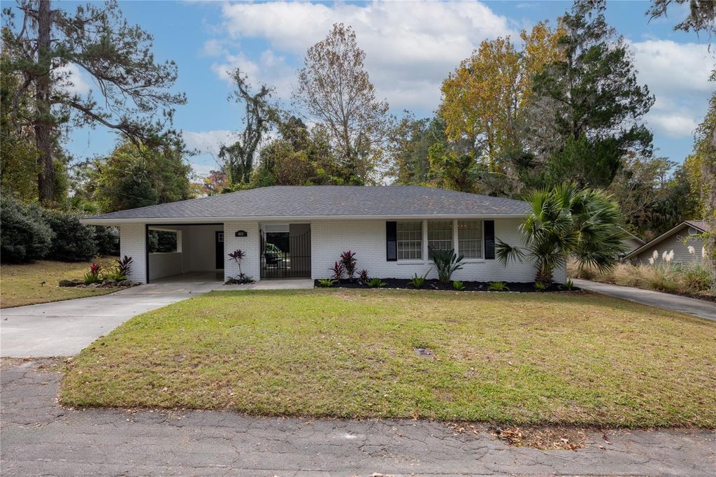 Photo of 822 NW Palm Drive, Lake City, FL 32055 (MLS # GC535880)
