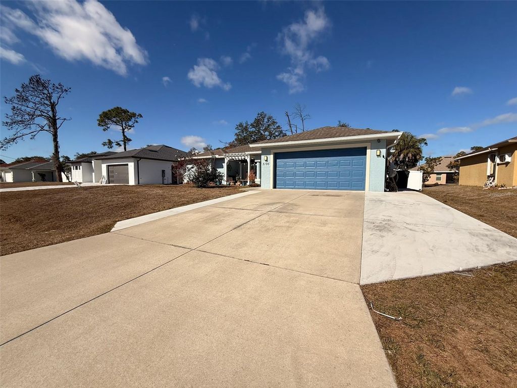 Photo of 3195 Mayflower Terrace, North Port, FL 34286 (MLS # O6390495)