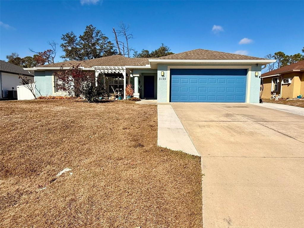 Photo of 3195 Mayflower Terrace, North Port, FL 34286 (MLS # O6390495)
