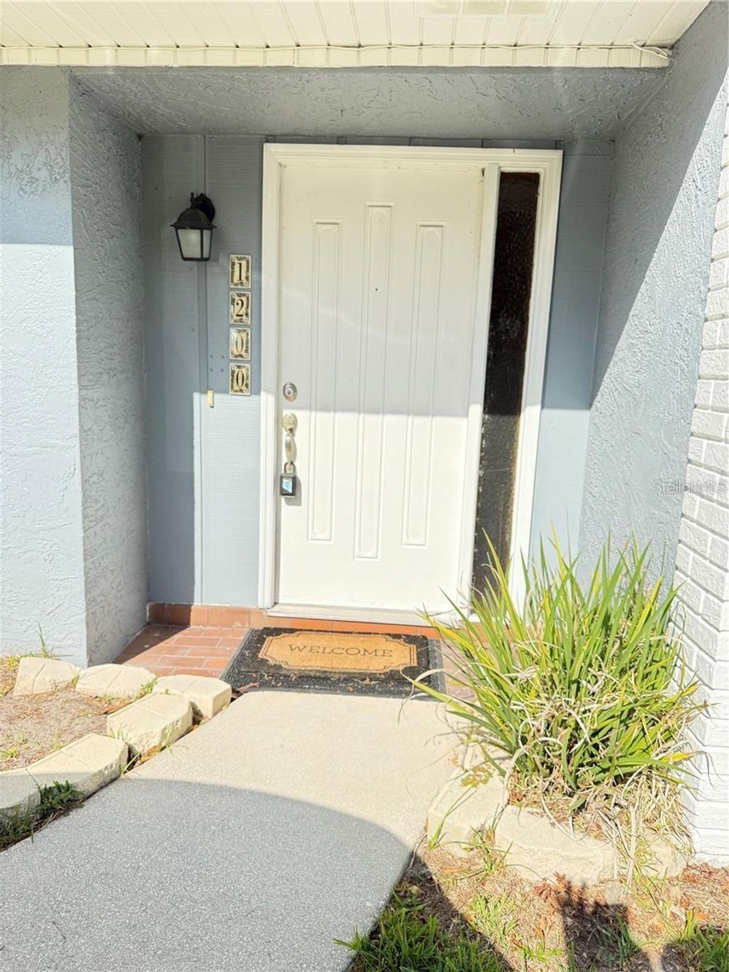 Photo of 1200 Abbey Crescent Lane, Clearwater, FL 33759 (MLS # TB8496633)